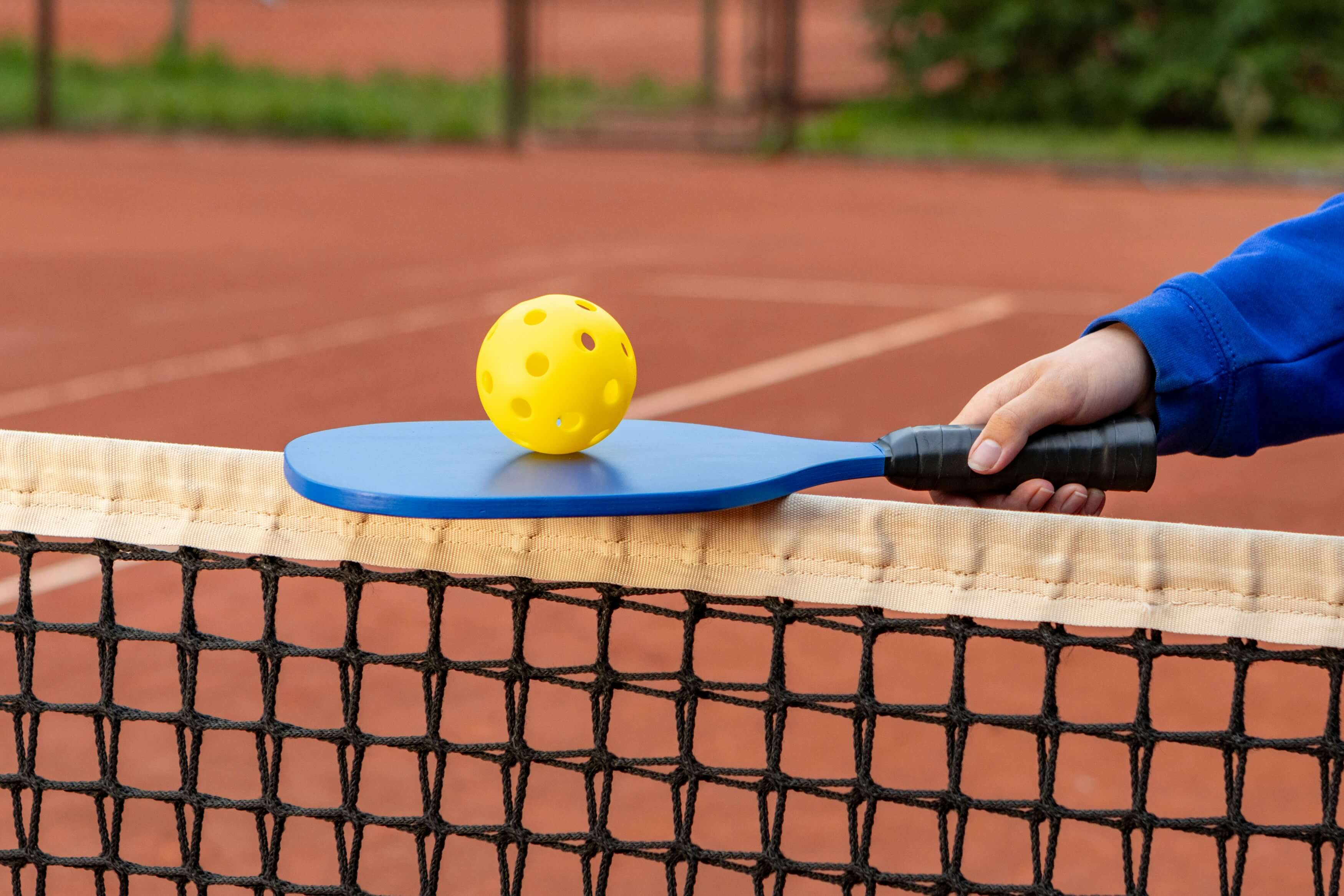 Jugadores practicando deporte de raqueta